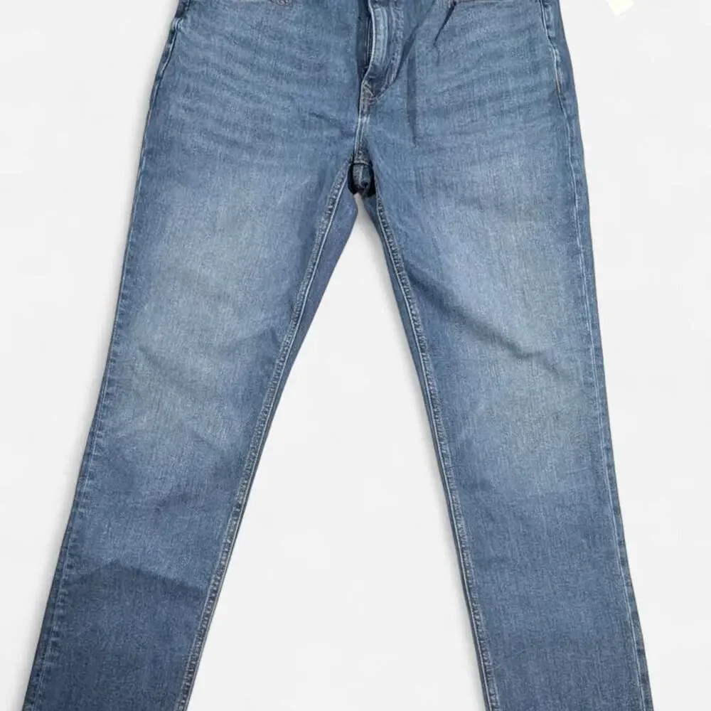 Banana Republic Mens Slim Traveler Jeans NWT 33x32 Stretch Denim Medium Wash.